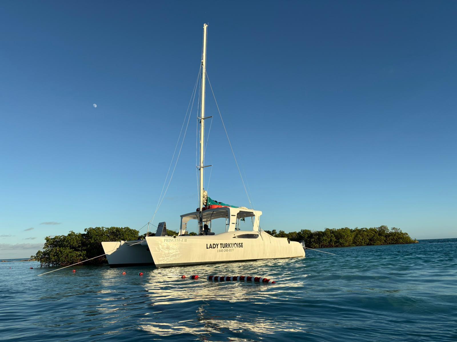 Guests enjoying golden hour aboard a Lady Turkuoise sunset cruise, Turks and Caicos