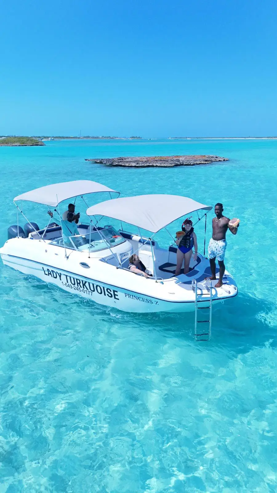 Guests diving for fresh conch in Turks and Caicos